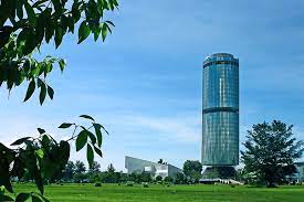 Tun Mustapha Tower Formely Known As Yayasan Sabah Building This 30 Storey Circular Glass Building Is Su Glass Building Interesting Buildings Round Building