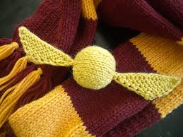 Knit in 1×1 rib with affordable acrylic yarn, this scarf is great for beginner knitters looking for a new challenge beyond garter stitch. Just Crafty Enough Free Pattern The Golden Snitch