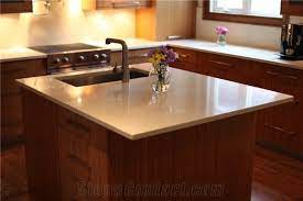 A shaped island unit can also help direct the flow of traffic away from busy incorporate a slimline kitchen island to mirror the surrounding work surfaces, in order for the island. Solid Surface Kitchen Island Countertop From Canada Stonecontact Com