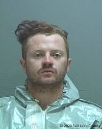 Salt Lake City riots: Two men charged after Salt Lake City police car  torched during riots