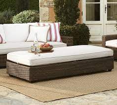With traditional coffee tables, you're stuck with wood, metal, or plastic. Torrey All Weather Wicker Grand Coffee Table Ottoman Espresso Pottery Barn
