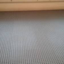 This interlocking tile is a center tile that comes with removable edge pieces on two ends, which allows you to turn any tile into a corner, border, or center tile. Techfloor Premium Garage Floor Tile Traction Tiles Garage Garage Floor Tiles Garage Floor Flooring