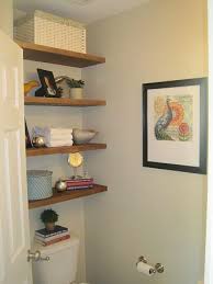 Shelves Over The Toilet Are A Great Idea Have A Couple Different Baskets In Different Sizes To Hold You Etagere Bois Flotte Idees Etageres Deco Salle De Bain