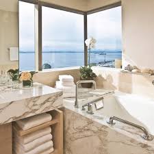 Wake Up With A Soak In The Jacuzzi Tub Overlooking Elliott Bay Enjoy This Stunning Corner View Of The Downtown Wa Seattle Hotels Hotel Seattle Hotels Downtown