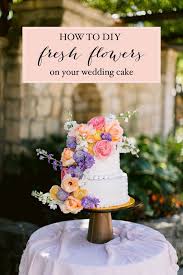 If your wedding style is clean and minimalist, we love this chic confection featuring square cake tiers on lucite boxes filled with white tulips. Diy Your Wedding Cake With Fresh Flowers And Not Blow Your Budget