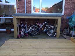 Bike Shed Made From 4 Pallets Two Decking Boards Amp A Roll Of Cheap Shed Felt Total Cost 22 Outside Bike Storage Bike Shed Outdoor Bike Storage