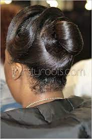 Black updo hairstyles look great when worked with curls. Black Women Updo Hairstyles