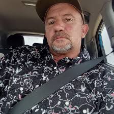 Pursuant to Oklahoma state law, drivers are mandated to activate their  headlights when utilizing windshield wipers during precipitation, whether  rain, snow, or otherwise. This stipulation is classified as a 'conjunction  law,' aimed