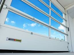 Metal buildings, loading bays, industrial doors. Sektionaltor K Vision By Kopron