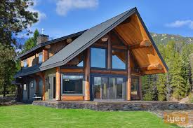 Stunning family cottage with beautiful balcony and walkout basement. Post And Beam Home Kits Change Comin