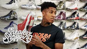 The most obvious reason is limited restrictions. Nba Youngboy In Shoe Rack Background Wearing Black T Shirt Hd Nba Youngboy Wallpapers Hd Wallpapers Id 48834