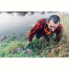 Michael DeClercq, superintendent of water and waste water for the City of  Gallup, shows a pipe that was excavated from a street in the city due to  early deterioration from an increase