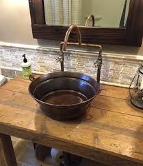 A bathroom that is bright and vibrant, with it's vanity as it's main. 15 Rustic Copper Bucket Vessel Bath Sink Bucket Sinks