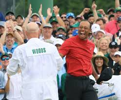 Tiger woods at the masters tiger woods celebrates after sinking his putt on the 18th green to win during the final round of the masters at augusta national golf club on april 14, 2019 in augusta, georgia. Thinking Of His Dad Tiger Woods Notches A Masters Victory That His Children Will Remember South China Morning Post