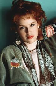 80s star Molly Ringwald, 55, looks ageless as she flaunts toned legs in  ripped jean skirt and knee-high boots for GMA