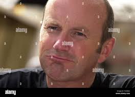 Comedian and tv personality Fred Macaulay who is appearing in the Fringe  Festival is pictured taking in the sites and sounds of the Festival Stock  Photo