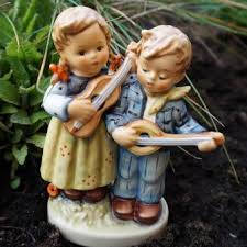 Hummel figurines (also known as m.i. Hummel Figurines Discover The Endearing Collectibles Lovetoknow