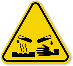 You may not ever see this warning symbol, but if you do it would be in your best interest to know what it means. Iso Corrosive Materials Sign