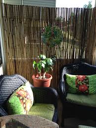 Easy Makeover Using Bamboo Fencing For Privacy Spray Paint On Chairs And Little Sewing Results Cozy Cond Balcony Privacy Condo Balcony Small Balcony Decor