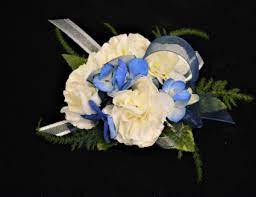 Keep an eye on your inbox so you know when your items are available. Blue Beauty Corsage For In Store Pick Up Only Wrist Corsage In Holland Mi Glenda S Lakewood Flowers