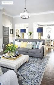 With the yellow tone, the place will gain some fun, playful, and warm look. Gray And Blue Living Room Hmdcrtn