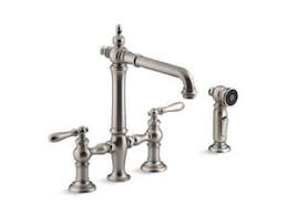 The spray head is missing the cover for the button that makes water stop coming out of it, but no one really uses that anyway, right? Kohler Artifacts Two Handle Bridge Kitchen Faucet In Vibrant Stainless 76519 4 Vs Ferguson