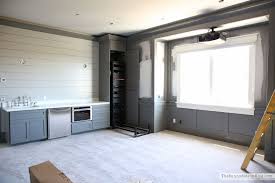 Theatre room ~ how fabulous is this idea of using recycled shipping planks for a screening 6. Theatre Room With Grey Paint And Appliances The Sunny Side Up Blog