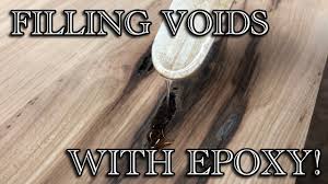 Thoroughly mix the glue and sawdust. How To Fill Cracks And Voids With Epoxy Resin Youtube