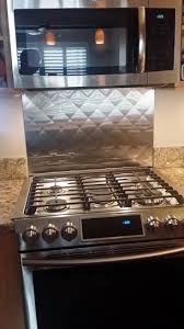 Home > stainless steel back splashes > bright quilt. Frigo Design 30 In X 30 In Quilted Stainless Steel Backsplash Hq3030ss The Home Depot Stainless Backsplash Steel Backsplash Stainless Steel Backsplash