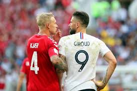 The denmark players crowded around eriksen after he collapsed on the pitchcredit: France And Denmark Advance In Scoreless Boredom