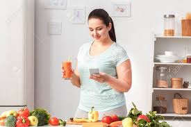 In english speaking countries, food is a big deal and so if you find yourself ready to cook with an english speaking friend. Cooking Meal Chubby Girl Standing In Kitchen Drinking Smoothie Stock Photo Picture And Royalty Free Image Image 132830471