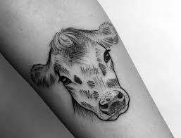 50 Cow Tattoos And Their Meanings Tattooviral Com Your Number One Source For Daily Tattoo Designs Ide Cow Tattoo Cow Skull Tattoos Tribal Sleeve Tattoos