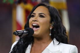 This is only a short preview of what is to come. Super Bowl 2020 Demi Lovato S National Anthem Performance Hair Makeup And Tan Allure