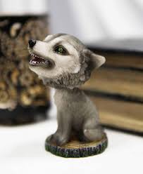 Real wolf with green eyes. Amazon Com Ebros Gift Cries Of The Night Howling Gray Wolf Direwolf With Green Eyes Bobblehead Figurine 3 75 Tall Lycan Timberwolf Bobble Head Statue Home Kitchen