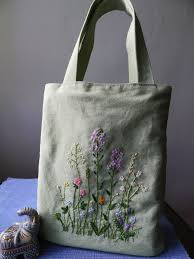 Yes we are talking about the lovely bags, totes and the purses serving the carrying purposes for our various outdoor trips. Handmade Pouch With Floral Embroidery Tote Bag Embroidery Tote Bag Factory Embroidery Bags Sewing Embroidery Designs Flower Embroidery Designs