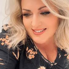 Kate McInerney, prinicpal, and Dr. Blow, superintendent, congratulate  Michele Frantz for being selected as the Orcutt School District Teacher of  the Year. Mrs. Frantz is a first grade teacher at Joe Nightingale