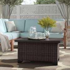 Crafted from wicker, it boasts a round silhouette awash in a neutral hue, blending effortlessly with your color scheme, this stylish coffee table will. Outdoor Coffee Wicker Rattan Patio Tables You Ll Love In 2021 Wayfair