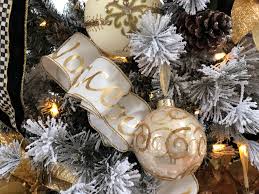 To gain his favour, choose the right new year decorations. The Double Triple Loop Ribbon Method For Decorating A Christmas Tree Happy Haute Home