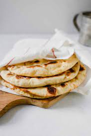 Make This Homemade Naan Bread Recipe Today With This Authentic Yet Simple Recipe That Uses A Cast Iron Recipes With Naan Bread Naan Bread Homemade Naan Bread