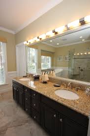 This makes for an intriguing yet stylish space. Dark Bath Cabinets By The Bath Remodeling Center Llc