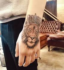 Realism style colored shoulder tattoo of lion with crown and. 15 Best Lion Tattoos For Men And Women With Images Way2info Com