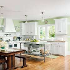 Subway tiles are the classic choice and would be an inexpensive option so you can save money for a future renovation but i would lean into. Green Walls White Cabinets Kitchen Novocom Top
