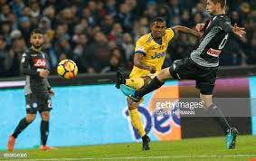 Juventus Forward From Brazil Douglas Costa Fights For The Ball With Napoli Juventus Photo
