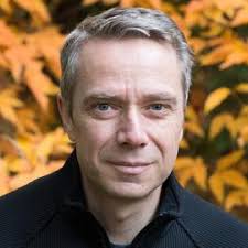 Inferring the Material Properties of Granular Media for Robotic Tasks