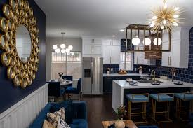 Here are ten gorgeous dining rooms with brown walls. Eclectic Blue Living Room With Gold Mirror Hgtv
