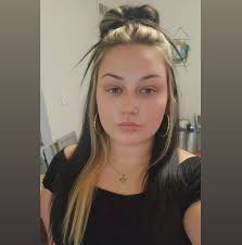 Do you have to remove piercings for the dolphin swim at Discovery Cove?