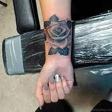 A rose in the tattoo has a deep meaning. 15 Delightful Black Rose Tattoos On Wrist