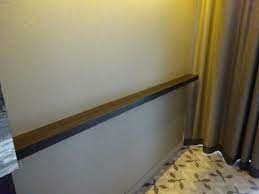 It takes the form of a horizontal strip of decorative wood, fixed at the same height as the chair. Handy Dado Rail Shelf Picture Of Pullman Hotel Munich Tripadvisor