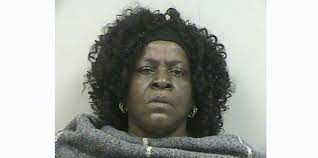 Woman charged in false report