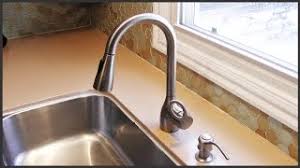 This guide will show you how to remove your old kitchen faucet, the basics of faucets and how the number of holes and the spread in your kitchen sink or countertop will determine the type you can install. Removing Hard Water Deposits From A Faucet Head Youtube